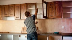 To prepare your cabinets for refacing, take out all the drawers and remove the doors. How Much Does It Cost To Remodel A Kitchen Bankrate