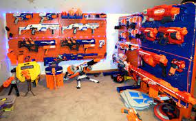 Nerf guns like to peg darts at unsuspecting targets (parents), so a peg board seems a fitting home for them. Wall Control Pegboard Nerf Gun Wall Rack Nerf Blaster Wall Organizer Room Modern Kids By Wall Control Houzz