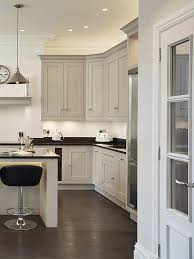 Cream Kitchen Cabinets With Black