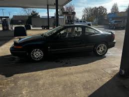 Image result for Black Gold 1995 Saturn