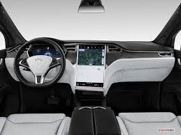 A huge touchscreen infotainment system dominates the dashboard and controls nearly all of the model x's various features and settings. 2020 Tesla Model X 106 Interior Photos U S News World Report