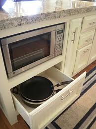 Hodedah kitchen island cabinet drawer storage with large spice and towel rack with wheels, chocolate. Old Sweetwater Cottage No Man Or Woman Is An Island Kitchen Island Storage Kitchen Island Microwave Microwave In Kitchen