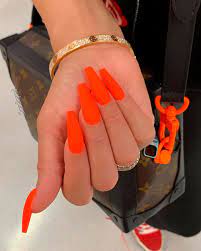 For your evening look, paint your nails ready. Neon Matte Orange Nails Matte