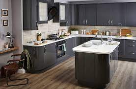 A pretty contemporary kitchen with a small white kitchen with double ceilings, the height is used for additional storage cabinets here, which is a veyr smart idea. Pin On New House Ideas