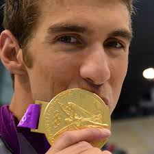 Chronicling Michael Phelps' history as king of the Olympic rings