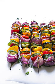 Thread mushrooms, tomatoes, bell peppers, onion and zucchini onto skewers. Easy Grilled Veggie Skewers The Forked Spoon