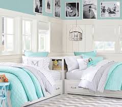 Mirroring each bed, a bookshelf acts as a miniature library holding favorite stories, coloring books, board games, movies, and more. Branson Reversible Euro Sham Twin Girl Bedrooms Shared Girls Bedroom Shared Girls Room