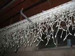When you have reached the first planter and have formed a rectangular outline of lights, begin zigzagging the lights from one side of the outline to the other, spacing the passes of string far enough apart so that they will be evenly distributed to the end. Hang Outdoor Holiday Lights Quickly Tutorial Hanging Christmas Lights Diy Christmas Lights Outdoor Christmas Lights