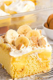 This is the easiest pudding poke cake loaded with delicious pudding, bananas and more for a tasty dessert you will make again and again! Banana Pudding Poke Cake Amanda S Cookin Cake Cupcakes