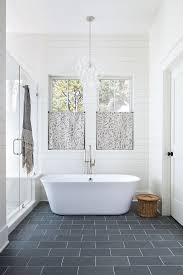 Tile is often the most used material in the bathroom — so choosing the right one is an easy way to kick up your bathroom's style. Bathroom Shiplap Ideas Gorgeous Master Bathroom With Floor To Ceiling Shiplap Paneling Bathroom Shiplap Cheap Bathroom Vanities Bathrooms Remodel Bathroom Tub