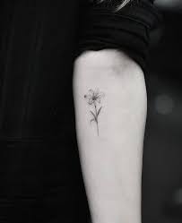 Pin By Kaja On There Is Never Too Many Tattoos Small Lily Tattoo Lily Flower Tattoos Lily Tattoo