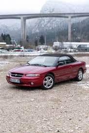 Image result for Dark Garnet Red 2001 Stratus