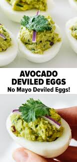 Avocado Deviled Eggs Are An Easy Tasty Variation Of The Classic Recipe Just Combine Hard Boiled Guacamole Recipe Easy Avocado Deviled Eggs Deviled Eggs Easy