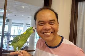 CTK CLERGY'S "KISSING SCENES" AT CORINTHIAN GARDENS! Corinthian Gardens  held their pet blessing after their daily Mass. Among the beloved animals  present was Petunia, the parrot, a daily mass goer as attested