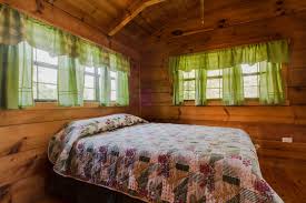 Log cabin rustic walnut and silver twin low loft bed with dual underbed drawers the log cabin look makes for a great addition the log cabin look makes for a great addition to any outdoor adventurer's room. Campground Cabin With Bunk Beds And Loft Near Bryson City Nc