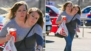 Conjoined twins Abby and Brittany Hensel spotted running errands after wedding goes viral - AFROMAMBO.COM