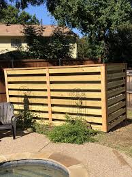 Prior to putting the pool walls together, many companies will stone the bottom of the pool and overdig for a better substrate. Fence To Hide Pool Equipment Backyard Pool Designs Pool Equipment Enclosure Backyard Pool Landscaping