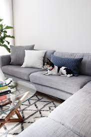 Step Into This Fabulous Art Deco Miami Apartment And Learn Laura Greig S Beach Y Style Inspiration Florida Living Room Small Space Living Miami Art Deco