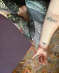 Hope love tattoo on wrist. 17 Tattoos Which Symbolize Hope Saved Tattoo