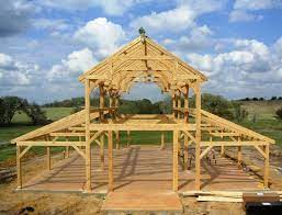 Every step of the construction process has been captured herein. Post And Beam Construction Building With Wood