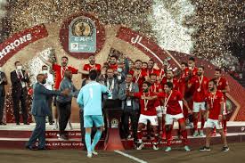 وتشهد مباراة النادي الأهلي أمام نادي الترجي، عدد من المفاجآت فى تشكيل المارد الأحمر، خاصة بعد استقرار النادي على عدم البدء بمحمد مجدي قفشة لاعب الفريق، تخوفًا عليه من زيادة حجم الإصابة، بعد أن لحقت به المباراة فى لقاء نهضة بركان في السوبر الإفريقي. Ù…ÙˆØ¹Ø¯ Ù…Ø¨Ø§Ø±Ø§Ø© Ø§Ù„Ø£Ù‡Ù„ÙŠ ÙˆØ§Ù„ØªØ±Ø¬ÙŠ Ø§Ù„Ù‚Ø§Ø¯Ù…Ø© ÙÙŠ Ù‚Ø¨Ù„ Ù†Ù‡Ø§Ø¦ÙŠ Ø¯ÙˆØ±ÙŠ Ø£Ø¨Ø·Ø§Ù„ Ø¥ÙØ±ÙŠÙ‚ÙŠØ§ Ø§Ù„Ø°Ù‡Ø§Ø¨ ÙˆØ§Ù„Ø¹ÙˆØ¯Ø© ÙƒÙ„Ù…Ø© Ø¯ÙˆØª Ø£ÙˆØ±Ø¬