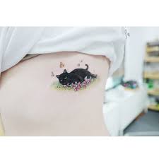 Cute Black Cat Tattoo On Side For Girls By Tattooist Banul Cat Tattoo Designs Black Cat Tattoos Tattoos