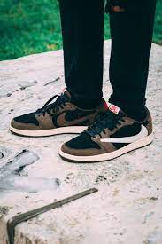 Travis scott and air jordan collaborated on another color way of the jordan 1 silhouette and this time they created a unique low color way! Travis Scott X Air Jordan 1 Low On Feet Closer Look Photos Hypebeast