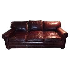 Coffee bean finish on sofa legs. Old Hickory Tannery Leather Sofa Aptdeco