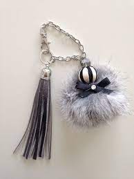 pinterest 世界中のおしゃれアイデアまとめ pinterest でおしゃれアイデアをまとめましょう ファーチャーム handbag charms leather tassel jewelry
