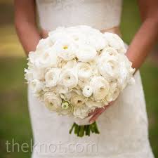 A Round Tightly Bunched Bouquet Made Of Ranunculus Hydrangeas And Other White Flowers White Bridal Bouquet White Wedding Bouquets Wedding