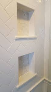 Herringbone White Subway Tile With Carrara Marble Hexagonal Tile In His And Her Shower Niches Cubbies Small Master Bathroom Bathrooms Remodel Shower Niche