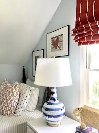 Baby blue or even teal blue curtains would look great in a striped or floral pattern. Blue White Lamp Light Blue Walls Kids Bedroom Emily A Clark