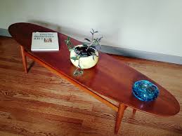 Vintage mid century, solid walnut, custom made high end quality large game coffee table with storage on rollers. Drexel Mid Century Surfboard Coffee Table Iconic Mid Mod Decor And Restoration