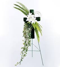 Choose from our range of funeral flowers, sympathy & condolences, wreaths, letter tributes, posies and baskets, sprays for any destination in uk. Elegant White Cross Funeral Flowers Beautiful Flowers White Crosses