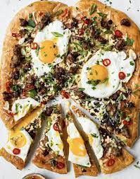 Sausage Cheddar And Egg Pizza With Chili Infused Maple Syrup By Thefeedfeed Quick Easy Recipe The Feedfeed Recipe Egg Pizza Maple Syrup Recipes Great Dinner Recipes