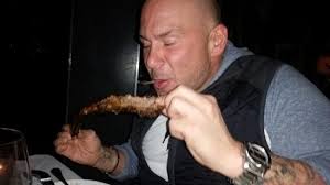 Tearing that steak up!