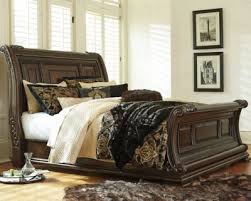 Valraven Queen Sleigh Bed Brown Rustic Bedroom Furniture Sleigh Beds Bed Furniture