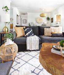 Pin By Annie Cameron On The Purple House Dark Couch Living Room Living Room Wood Floor Boho Living Room