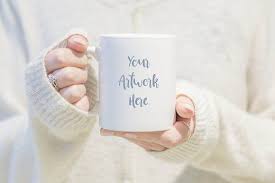 Download Mug Mockup Woman In White Jumper Free Logo Mockup Psd Mockup Free Psd Mugs
