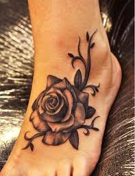 Small and many lily flower tattoo design on arm and shoulder. 72 Best Flower Tattoos On Foot
