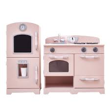 They encourage development via pretend play and inspire them to learn and grow. Pink Wooden Toy Kitchen With Fridge By Teamson Kids Play Kitchen Td 11413p Teamson Kids Ireland
