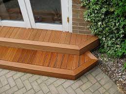 Hardwood Decking Steps Outside A Set Of French Doors Yellow Balau Decking Used And Finished With Oil Patio Deck Designs Patio Steps Deck Designs Backyard