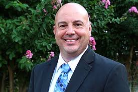 Fayetteville school district administrator charged with three counts of  sexual assault