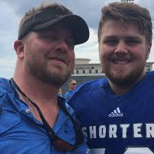 What beer is cousin drinking in the bathrobe scene?
