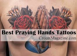 Rose praying hands body art 16. 40 Best Praying Hands Tattoos