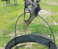 This lord of the rings fire pit is constructed to resemble the one ring and contains an inscribed text that can only be read when there is a fire inside the pit. Lord Of The Rings Fire Pit