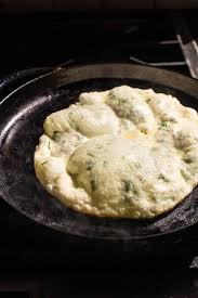 Cheesy Herb Stuffed Naan With No Yeast Option Half Baked Harvest Recipe In 2020 Half Baked Harvest Recipes Naan Half Baked Harvest