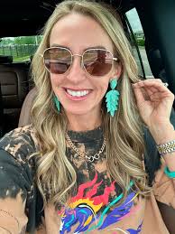 Wearing Tiered Leaf Earrings from Toasted Oak Boutique
