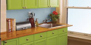 Right now, it's a flecked black/gray that for whatever reason picks up any reflection of blue in the vicinity, and while it's not horrible with the dark cabinets, it's still not what we have in mind. 10 Ways To Redo Kitchen Cabinets Without Replacing Them This Old House