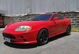 Image result for Sunny Yellow 2004 Tiburon